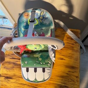 Dinosaur Baby Car entertainment with Piano Design.